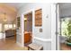 Hallway view leading to a bathroom and living room area with nice decor at 100 Birch N Coppice Dr. # 12, Surfside Beach, SC 29575