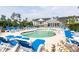 Inviting community pool area with lounge chairs, perfect for relaxation and enjoyment at 100 Birch N Coppice Dr. # 12, Surfside Beach, SC 29575
