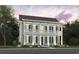 Charming two-story home with a double porch, dark shutters and manicured landscaping at 1079 Milford Way, Myrtle Beach, SC 29588