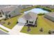 Aerial view of a well maintained house with a pond in the backyard, showing the landscape of the neighborhood at 1135 Sennema Circle, Myrtle Beach, SC 29588