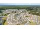 Aerial view of residential community featuring multiple ponds, trees, and well maintained lawns at 1135 Sennema Circle, Myrtle Beach, SC 29588