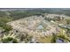 Overhead view of a residential community with ponds surrounded by lush greenery at 1135 Sennema Circle, Myrtle Beach, SC 29588