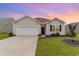 Charming single-story home with a manicured lawn and a one car garage in a well maintained community at 1135 Sennema Circle, Myrtle Beach, SC 29588