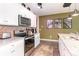 Well-equipped kitchen offers stainless appliances, granite counters, and modern finishes at 1135 Sennema Circle, Myrtle Beach, SC 29588