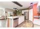 Open concept kitchen with granite countertops, island, and stainless steel appliances at 1135 Sennema Circle, Myrtle Beach, SC 29588