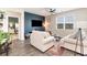 Inviting living room boasting a modern accent wall, stylish furniture, and an abundance of natural light at 1135 Sennema Circle, Myrtle Beach, SC 29588