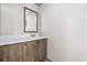 Bathroom featuring a wooden vanity with a white countertop and large mirror at 121 Forman Way, Aynor, SC 29511