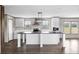 Modern kitchen featuring a large island, white cabinetry, recessed lighting, and stainless steel appliances at 121 Forman Way, Aynor, SC 29511