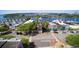 Picturesque aerial view featuring a historic clock tower and waterfront homes with boat docks at 122 Desurrency Ct., Georgetown, SC 29440