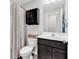 Bathroom featuring a shower-tub, storage cabinet, and updated vanity at 122 Desurrency Ct., Georgetown, SC 29440