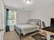 Cozy bedroom featuring natural light, a desk, and a comfortable bed at 122 Desurrency Ct., Georgetown, SC 29440