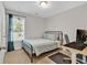 Cozy bedroom featuring natural light, a desk, and a comfortable bed at 122 Desurrency Ct., Georgetown, SC 29440