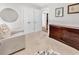 Bright bedroom features large dresser, neutral walls, and cozy sitting area at 122 Desurrency Ct., Georgetown, SC 29440