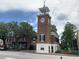 Historic brick clock tower in a charming town square, with surrounding trees and buildings at 122 Desurrency Ct., Georgetown, SC 29440