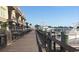 Picturesque marina featuring wooden walkways, luxury yachts, and waterfront dining opportunities at 122 Desurrency Ct., Georgetown, SC 29440