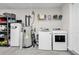 Well-organized garage featuring shelving, appliances, and storage solutions at 122 Desurrency Ct., Georgetown, SC 29440