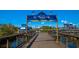 Scenic Harborwalk shopping and dining with boats and waterfront views under a bright blue sky at 122 Desurrency Ct., Georgetown, SC 29440