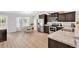 Bright eat-in kitchen with stainless appliances, dark cabinetry, and lots of natural light at 122 Desurrency Ct., Georgetown, SC 29440