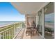 Balcony seating area with an ocean view, offering a relaxing retreat for coastal enjoyment at 1401 S Ocean Blvd. # 506, North Myrtle Beach, SC 29582