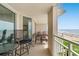 Inviting balcony with seating that offers an ocean view and a tranquil outdoor space at 1401 S Ocean Blvd. # 506, North Myrtle Beach, SC 29582