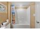 Full bathtub with a shower curtain and coordinated wallpaper, creating a tranquil bathing space at 1401 S Ocean Blvd. # 506, North Myrtle Beach, SC 29582