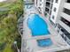 Large pool with sundeck, lounge chairs and steps to the beach boardwalk at 1401 S Ocean Blvd. # 506, North Myrtle Beach, SC 29582