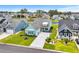 Beautiful home with a well-kept lawn and landscaping in a waterfront community with lake views at 143 Starlit Way, Myrtle Beach, SC 29579