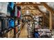 Unfinished attic with exposed beams, filled with boxes, luggage, and household items at 143 Starlit Way, Myrtle Beach, SC 29579