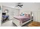 Charming bedroom with a bed, a desk, and ample natural light at 143 Starlit Way, Myrtle Beach, SC 29579
