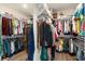 Spacious walk-in closet with built-in shelving and ample storage for clothes and accessories at 143 Starlit Way, Myrtle Beach, SC 29579