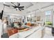 Open-concept living room with a modern design, seamlessly connecting the kitchen and dining areas at 143 Starlit Way, Myrtle Beach, SC 29579