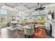 Bright living room with coffered ceilings, large windows, and comfortable seating at 143 Starlit Way, Myrtle Beach, SC 29579