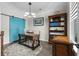 Office space features custom desk, shelving, and a sliding barn door at 143 Starlit Way, Myrtle Beach, SC 29579
