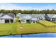 Beautiful home with a well-kept lawn and landscaping in a waterfront community with lake views at 143 Starlit Way, Myrtle Beach, SC 29579