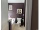 Bathroom featuring a soaking tub, toilet, vanity, and wall art at 1440 Brighton Ave., Myrtle Beach, SC 29588