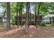 Multi-Gathering exterior with screen porches and mature trees at 146 Stillwood Dr. # 3, Pawleys Island, SC 29585