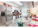 Modern kitchen featuring granite countertops, stainless steel appliances, and ample cabinet space at 146 Stillwood Dr. # 3, Pawleys Island, SC 29585