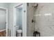 Bathroom with a marble tile shower at 1610 Old Tram Rd., Little River, SC 29566