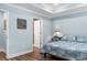 Bedroom with tray ceiling, adjacent to bathroom at 1610 Old Tram Rd., Little River, SC 29566