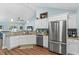 Open kitchen featuring stainless steel appliances, and hardwood floors at 1610 Old Tram Rd., Little River, SC 29566