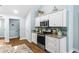 Kitchen with stainless steel appliances, and stylish tile backsplash at 1610 Old Tram Rd., Little River, SC 29566