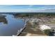 Aerial view of a marina with boats docked along the waterway in a charming coastal community at 1674 Sw Beach Dr., Calabash, SC 28467