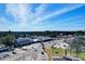 An aerial view showcasing the commercial district during daylight hours at 1674 Sw Beach Dr., Calabash, SC 28467