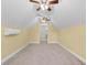 Finished attic space with carpeting, yellow walls, and a mini split system at 1674 Sw Beach Dr., Calabash, SC 28467