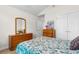 Comfortable bedroom with soft carpet, a mirror, and a dresser that offers plenty of storage at 1674 Sw Beach Dr., Calabash, SC 28467