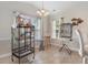 Bright dining room with tile floors, ample natural light, and bird cages at 1674 Sw Beach Dr., Calabash, SC 28467