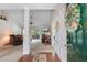 Inviting living room view from entry, showcasing open layout, fireplace, and access to outdoor patio at 1674 Sw Beach Dr., Calabash, SC 28467