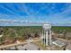 Scenic view of the Brunswick County Calabash, NC water tower surrounded by lush greenery on a sunny day at 1674 Sw Beach Dr., Calabash, SC 28467