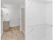 Modern bathroom featuring tile floors, vanity, toilet, shower, and wire shelving at 1931 Jasper St., Georgetown, SC 29440