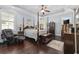 Spacious primary bedroom with hardwood floors, sitting area and abundant natural light at 200 Stonefly Ct., Murrells Inlet, SC 29576